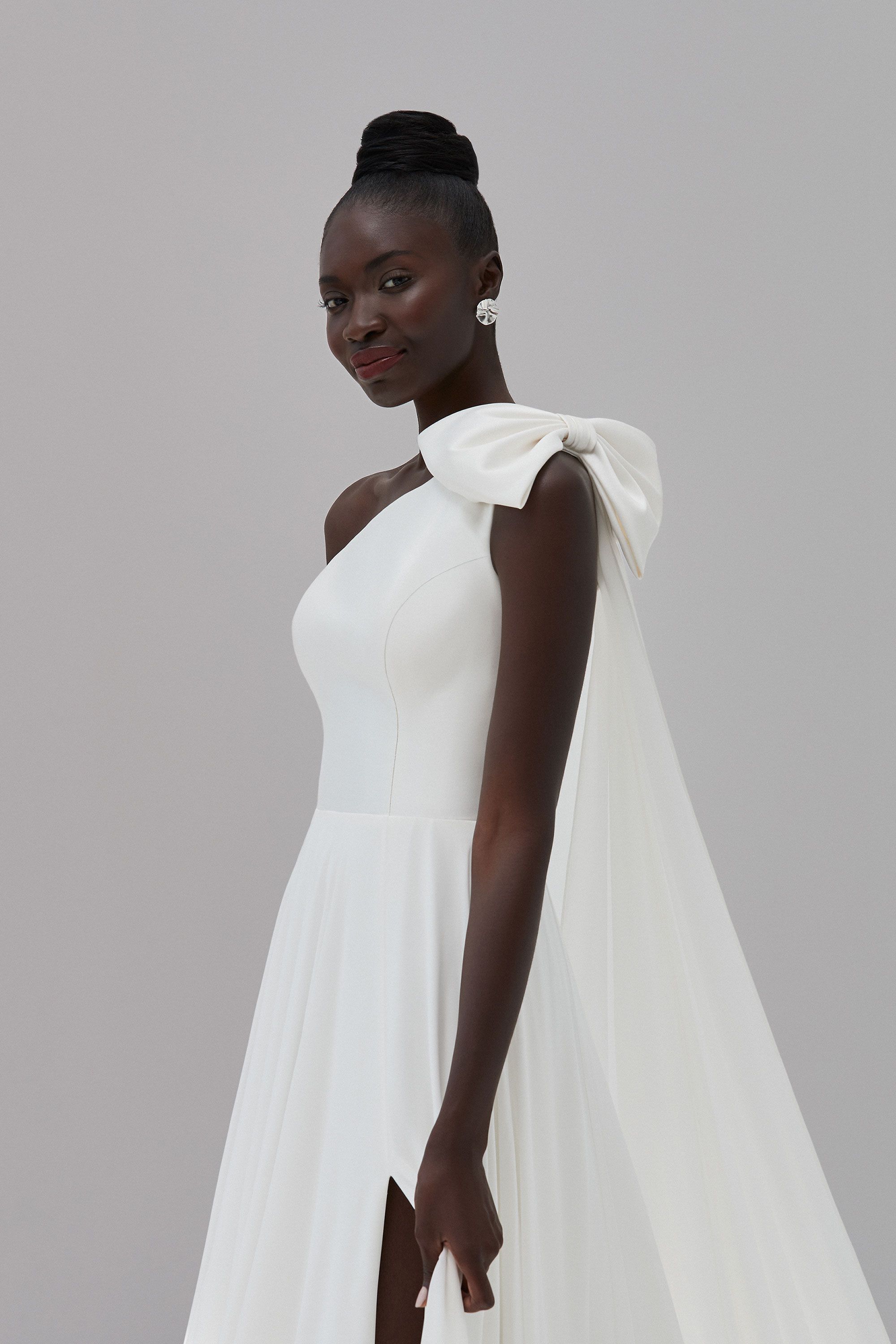 Justin Alexander Signature Style 99170 Gramercy One-Shoulder Gown With Bow Detail and Detachable Chiffon Streamer