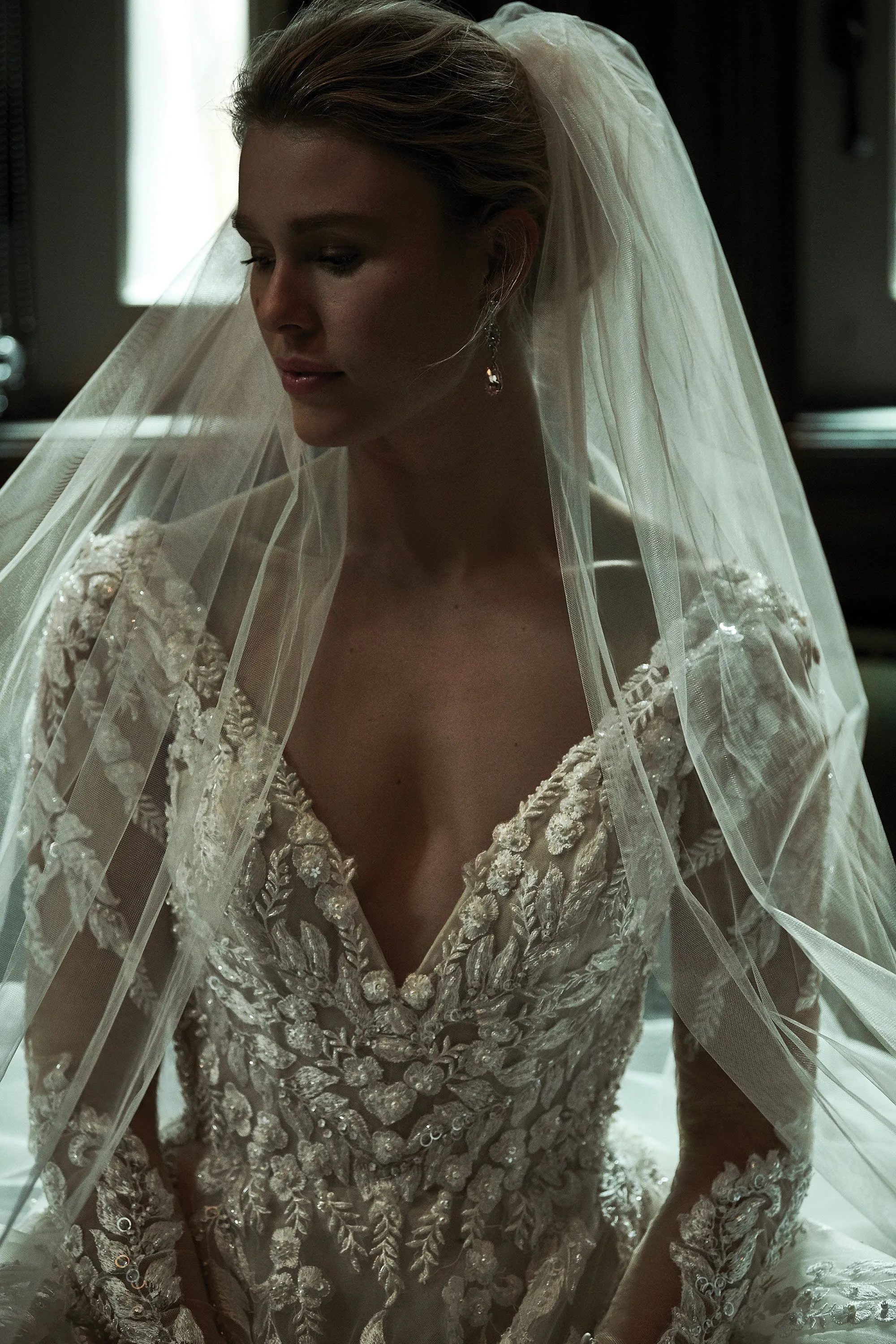 Justin Alexander Signature Style 99155 JULIE Floral Lace Gown with Long Sleeves and Deep V-Neck