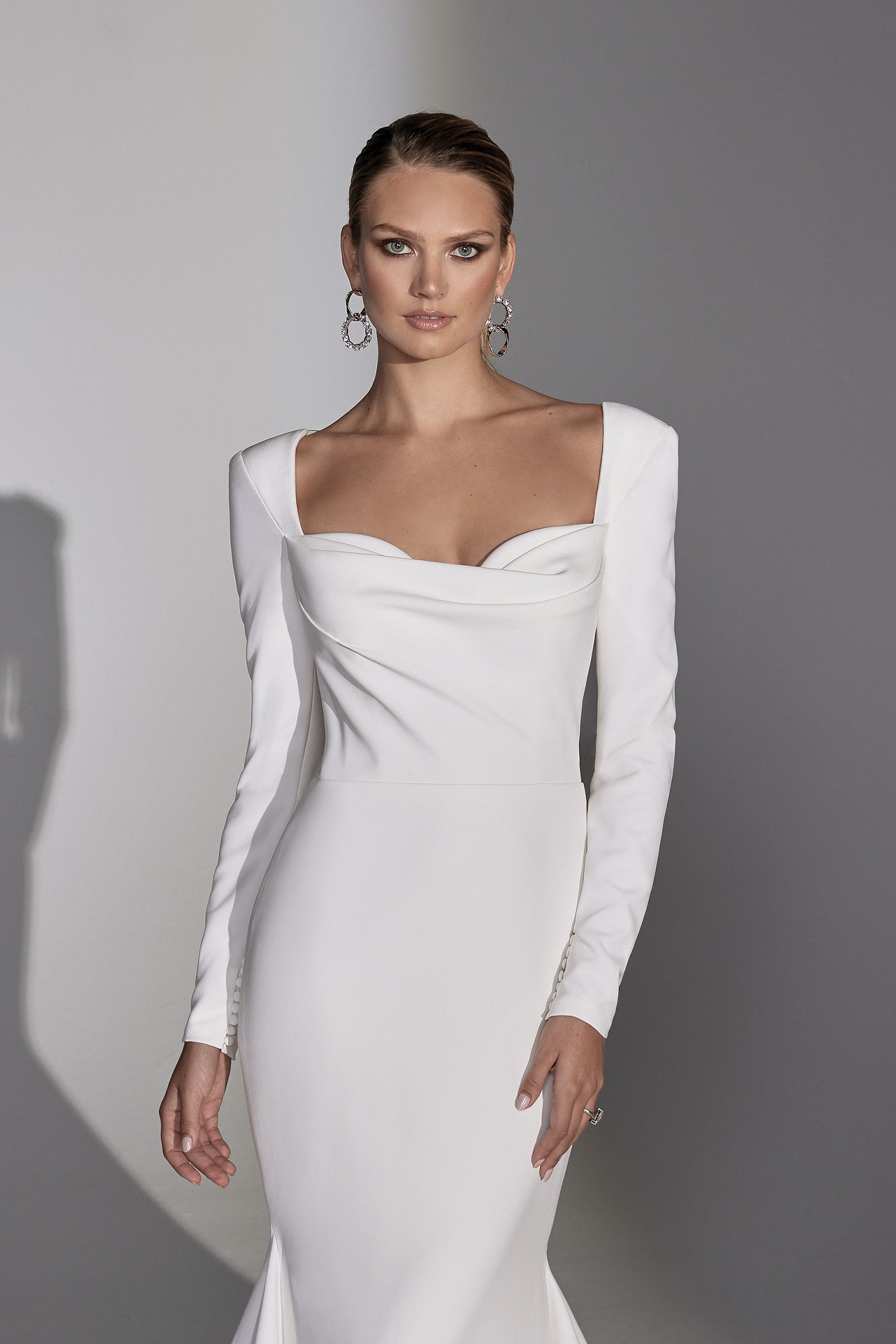 Justin Alexander Signature Style 99244 Norma Long Sleeve Fit and Flare Modern Wedding Gown with Illusion Back