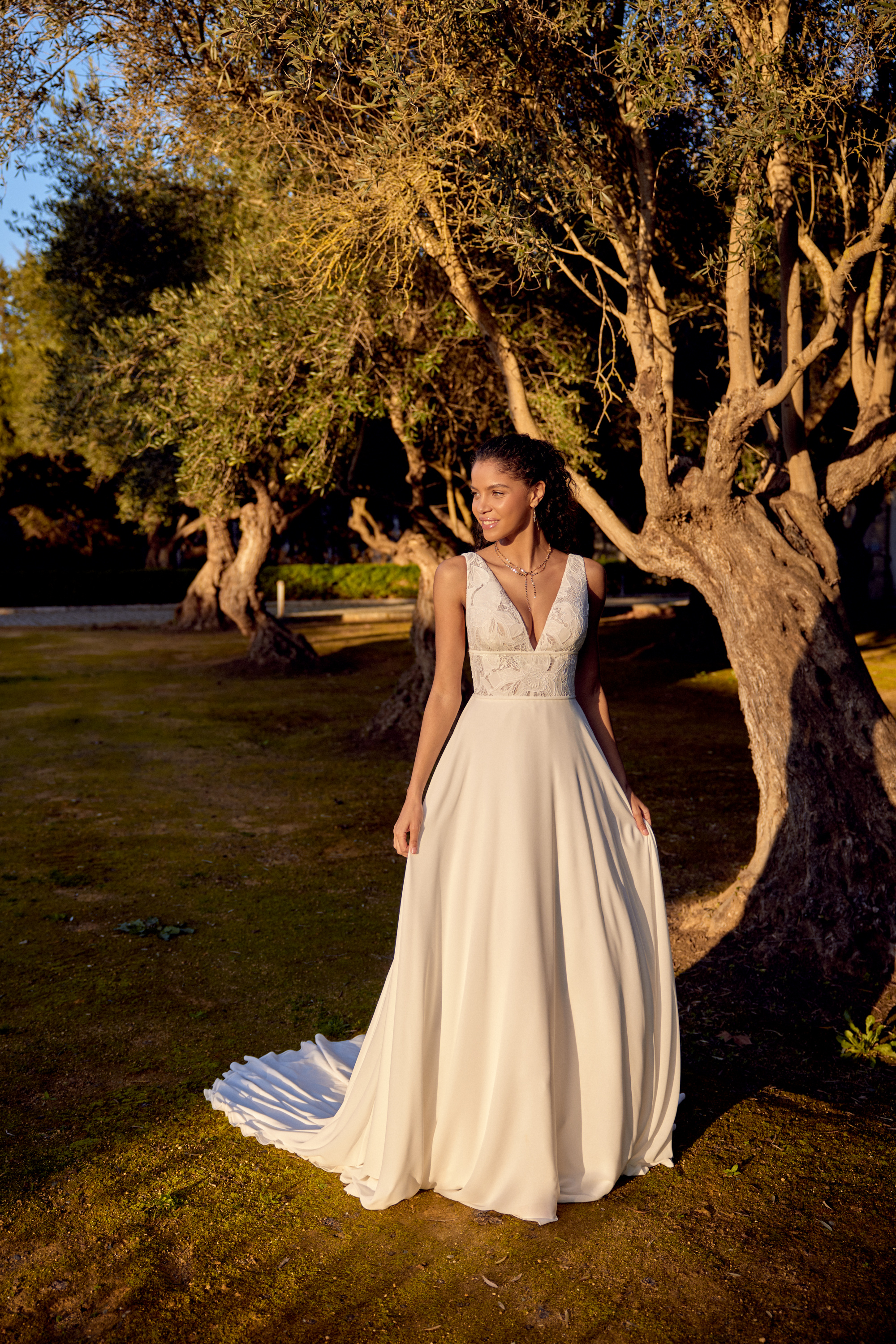 Lillian West Style 66419 Chiffon A-Line Gown with V-Neckline and Inset Waistband