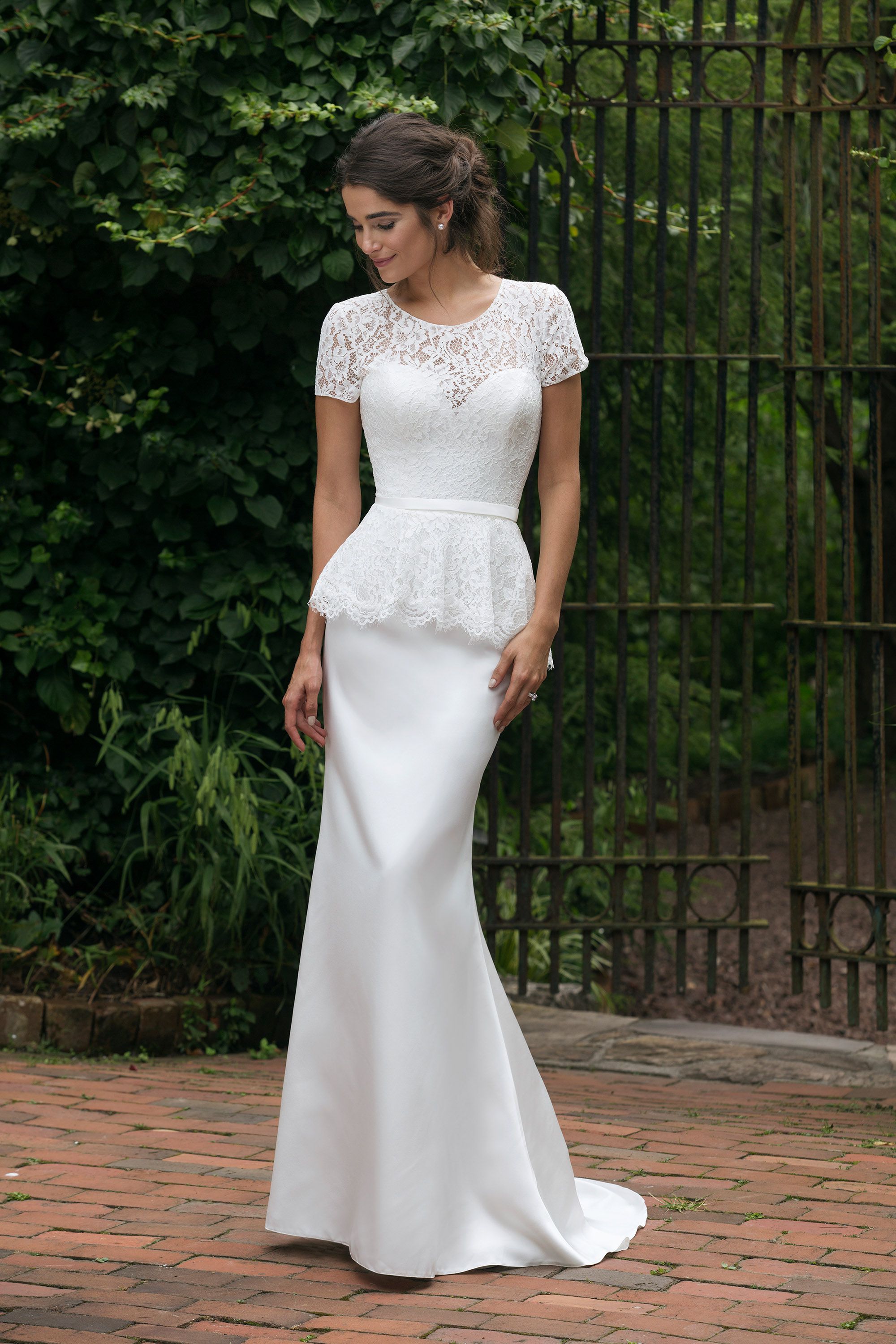 wedding dress with peplum waist 10 Peplum Wedding Gowns We're Absolutely Swooning Over