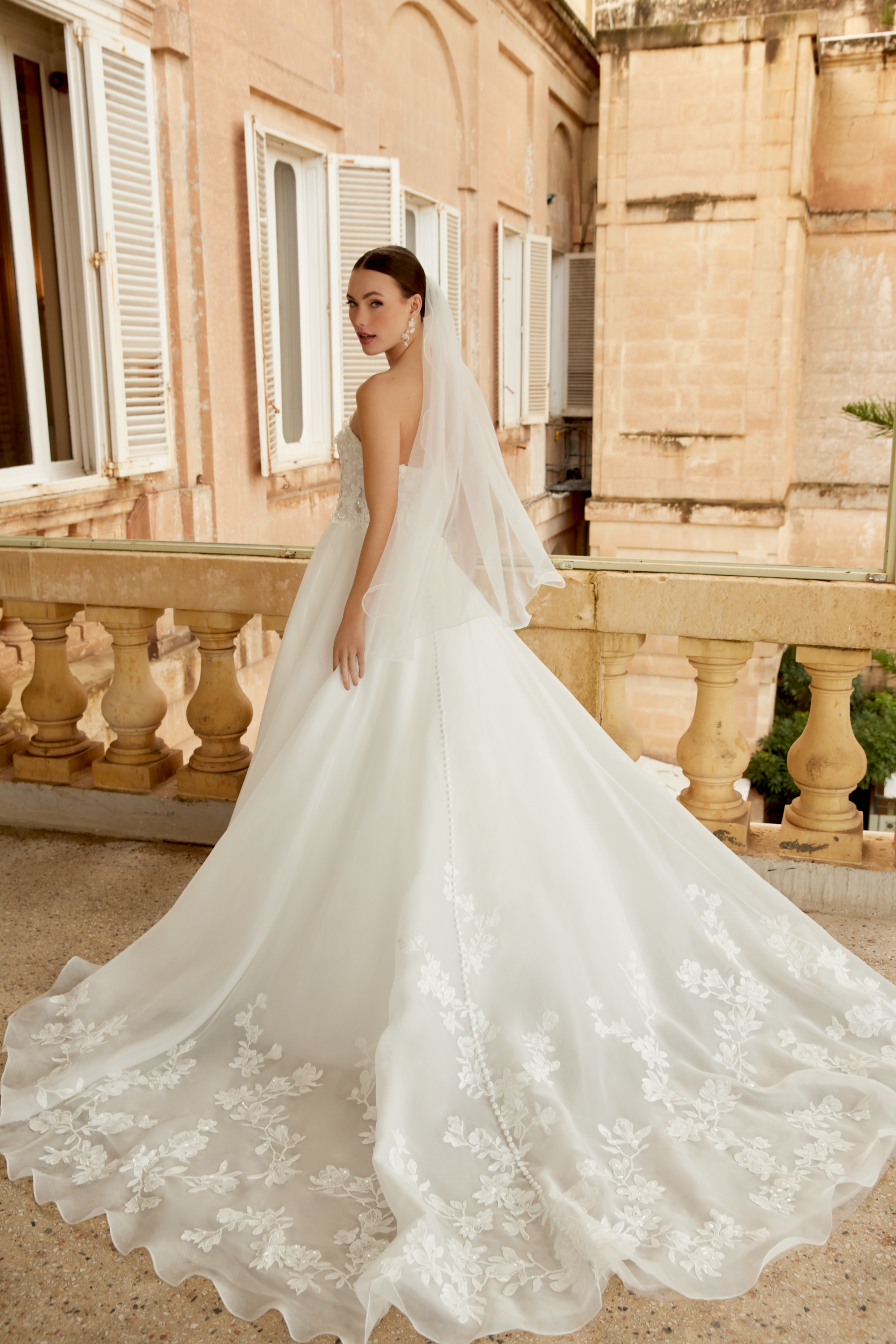 Sincerity Bridal Style 44604 Organza Ballgown with Illusion Bodice, Exposed Boning, and Lace Appliqués on the Circular Skirt and Train