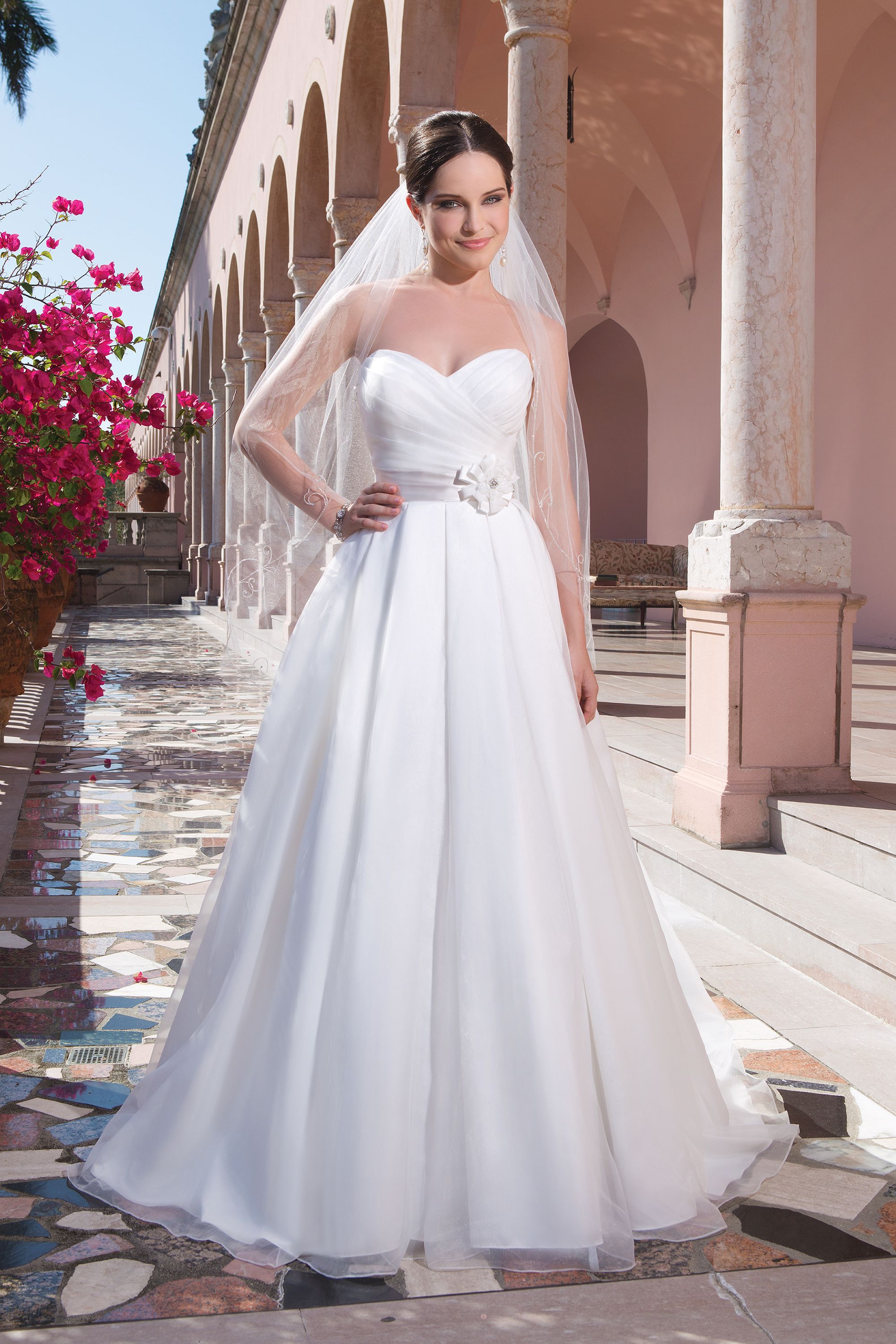 Sweetheart Gowns Style 6075 Organza ball gown accentuated by a sweetheart neckline